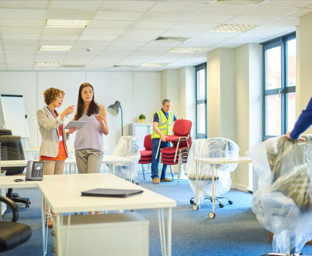 Workers organizing new office space